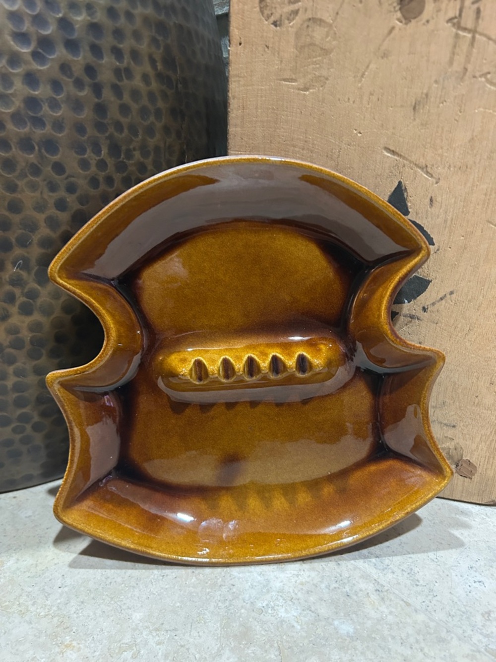 vintage Mid-Century Modern ceramic ashtray typically manufactured in the USA